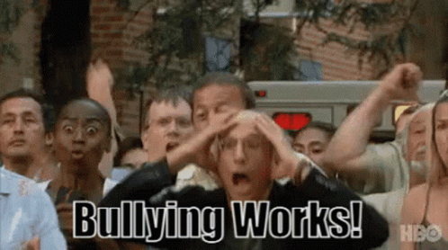 A Group Of People Are Standing In A Crowd With Their Hands On Their Heads And Bullying Works Written On The Screen . GIF