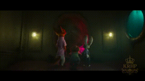 A Group Of People Are Standing In A Dark Room With Purple Lights . GIF