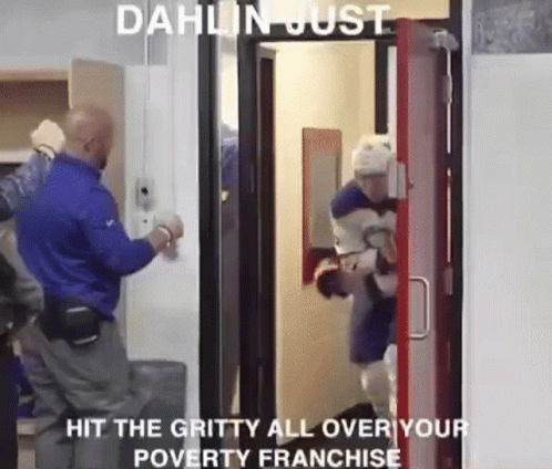 A Group Of People Are Standing In A Doorway With The Words `` Hit The Gritty All Over Your Poverty Franchise '' . GIF