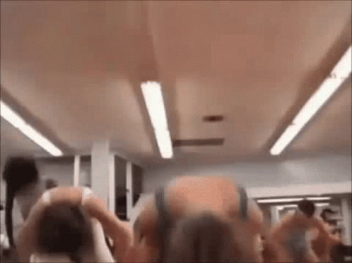 Group Of People Standing In Gym GIF