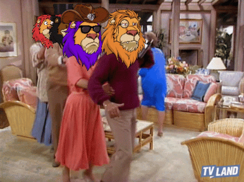 A Group Of People Are Standing In A Living Room With A Tv Land Logo On The Bottom GIF