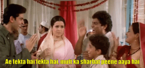 A Group Of People Are Standing In A Room With A Caption That Says Ae Fekta Hai Tekta Hai GIF