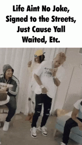 A Group Of People Are Standing In A Room With A Caption That Says Life Aint No Joke GIF