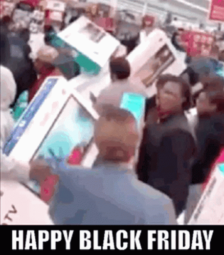 A Group Of People Are Standing In A Store Looking At A Computer Screen . GIF