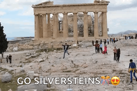 A Group Of People Are Standing In Front Of A Building With The Words Go Silversteins Written On The Bottom GIF