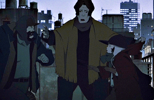A Group Of People Are Standing In Front Of A City Skyline At Night GIF
