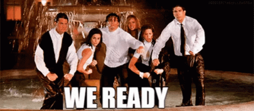 A Group Of People Are Standing In Front Of A Fountain With The Words We Ready Above Them . GIF