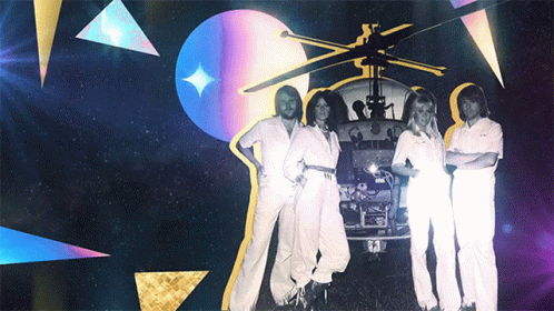 A Group Of People Are Standing In Front Of A Helicopter With The Number 62 On It GIF