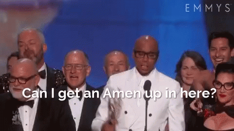 A Group Of People Are Standing In Front Of A Microphone With The Words Can I Get An Amen Up In Here GIF