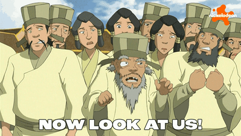 A Group Of People Are Standing In Front Of A Sign That Says " Now Look At Us " GIF
