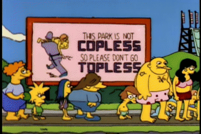 A Group Of People Are Standing In Front Of A Sign That Says This Park Is Not Copless So Please Don T Go Topless GIF