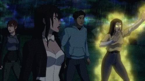 A Group Of People Are Standing Next To Each Other And One Of Them Is Glowing Yellow GIF