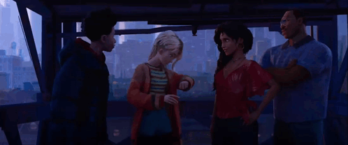 A Group Of People Are Standing Next To Each Other In A Room In Front Of A City . GIF