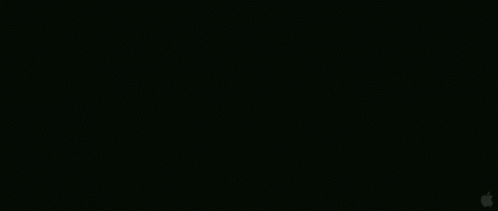 A Group Of People Are Standing On Top Of A Large Wall . GIF