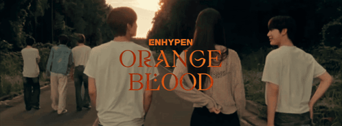 A Group Of People Are Walking Down A Road And The Words Orange Blood Are On The Bottom GIF