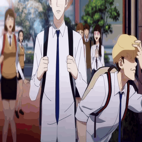 A Group Of People Are Walking Down A Street And One Of Them Has A Backpack GIF