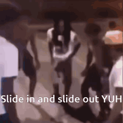 A Group Of People Are Walking In A Dark Room With The Words Slide In And Slide Out Yuh Written On The Bottom GIF