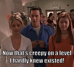 A Group Of People Are Walking In A Hallway With The Caption Now That 'S Creepy GIF