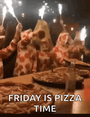 A Group Of People Dressed In Pizza Costumes Are Holding Sparklers And Eating Pizza .. GIF