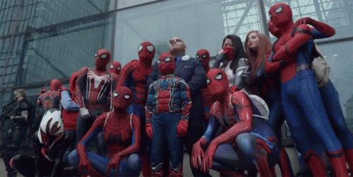 A Group Of People Dressed In Spider Man Costumes Pose For A Photo GIF
