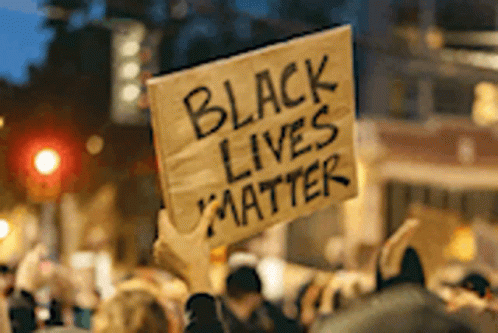 A Group Of People Holding A Sign That Says Black Lives Matter GIF