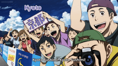 A Group Of People Holding A Sign That Says Kyoto On It GIF