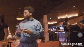 A Group Of People In A Bowling Alley With Make A Gif.com On The Bottom Right GIF