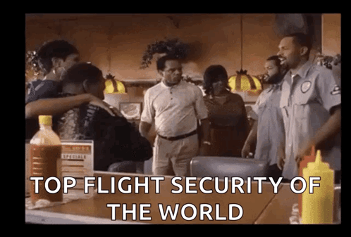 a group of people in a diner with the words top flight security of the world