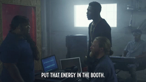 A Group Of People In A Room With The Words Put That Energy In The Booth On The Bottom GIF