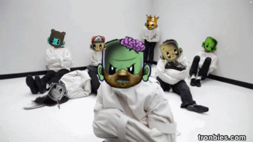A Group Of People In Straitjackets With Cartoon Faces On Them And The Website Tronbies.com GIF