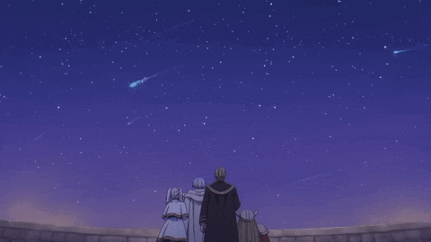 A Group Of People Looking Up At A Night Sky With Shooting Stars GIF