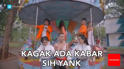 People On Merry Go Round With Text GIF