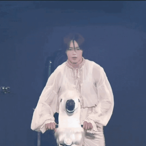 A Group Of People On A Stage With A Tokyo Girls Collection Sign In The Background GIF