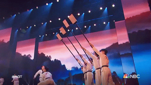 A Group Of People Performing On A Stage With Nbc Written On The Bottom GIF
