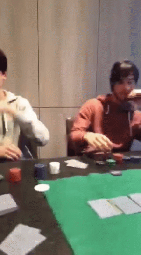 A Group Of People Playing A Game Of Poker GIF