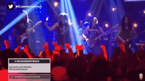 A Group Of People Playing Instruments In Front Of A Crowd With A Twitter Icon Above Them GIF