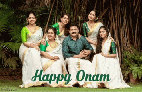 a group of people posing for a picture with the words happy onam below them