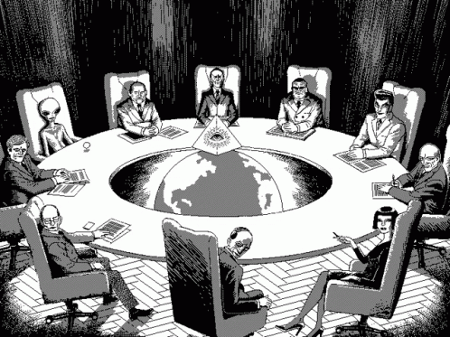 People Sitting Around Table With Pyramid GIF
