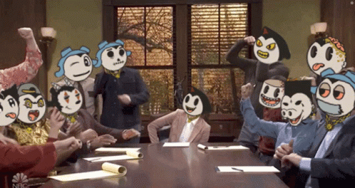 A Group Of People Sitting Around A Table With Nbc On The Bottom GIF