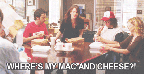 A Group Of People Sitting Around A Table With The Words Where 'S My Mac And Cheese ? GIF