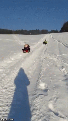 A Group Of People Sledding Down A Snowy Hill With Imgflip.com At The Bottom Of The Image GIF