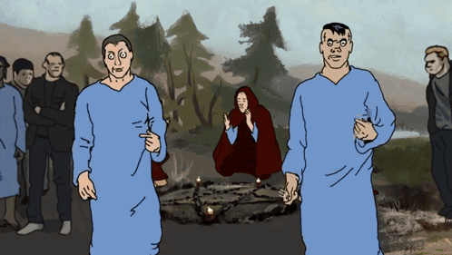 A Group Of People Standing Around A Circle With Candles In It GIF