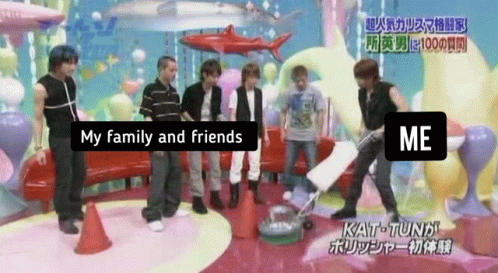 A Group Of People Standing Around A Vacuum Cleaner With The Words " My Family And Friends " On The Screen GIF
