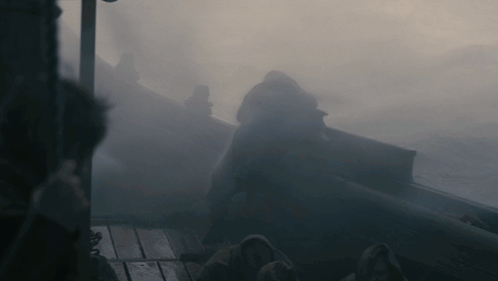 A Group Of People Standing In A Foggy Area GIF