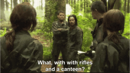 People Standing In Forest With Rifles And Canteen GIF