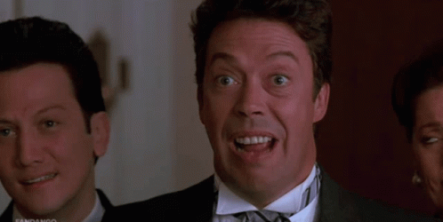 A Group Of People Standing In A Room With The Words We Love You GIF