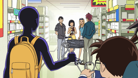 A Group Of People Standing In A Store With A Sign That Says ' I Love ' On It GIF