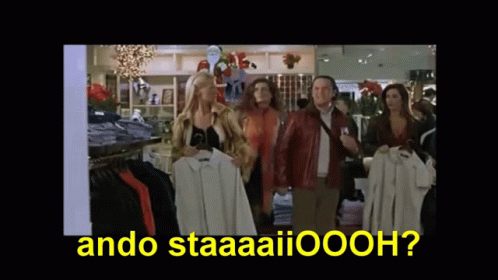 A Group Of People Standing In A Store With The Words " Ando Staaaaiioooh " On The Bottom GIF