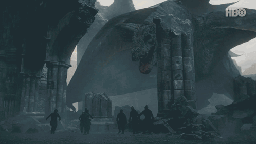 A Group Of People Standing In Front Of A Large Dragon With Hbo Written On The Bottom GIF