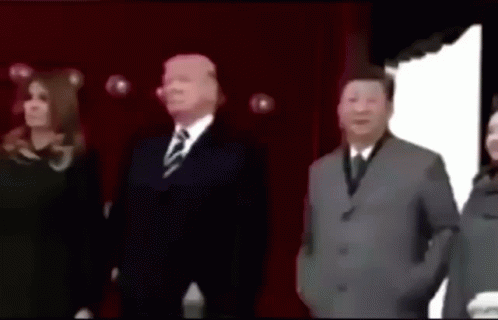 A Group Of People Standing In Front Of A Red Curtain Including Donald Trump And Xi Jinping GIF